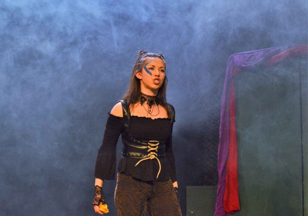 Actor in costume on stage