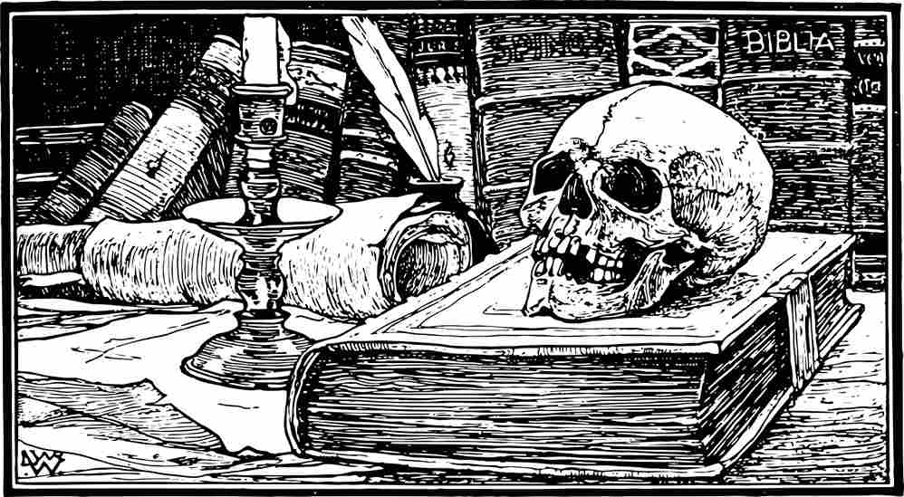 Monochrome skull and books on desk